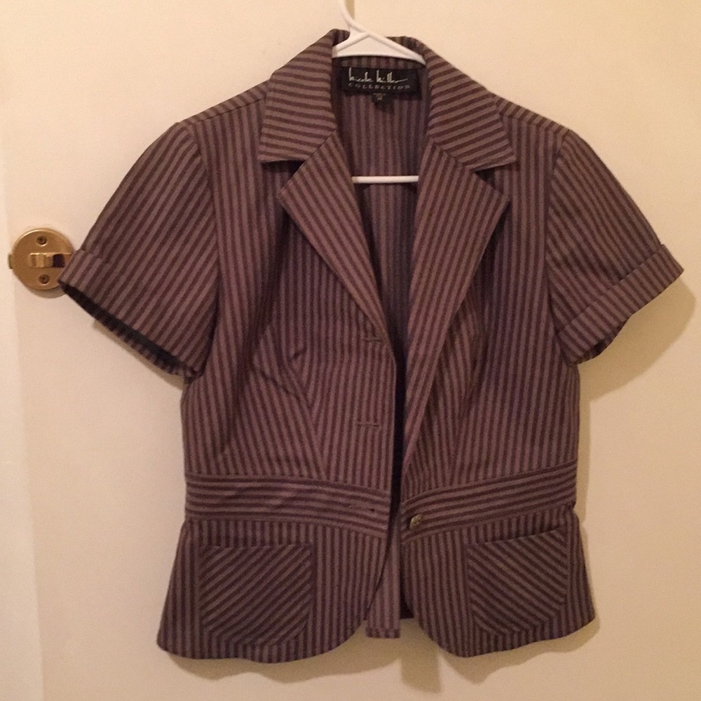 Nicole Miller three-piece suit.